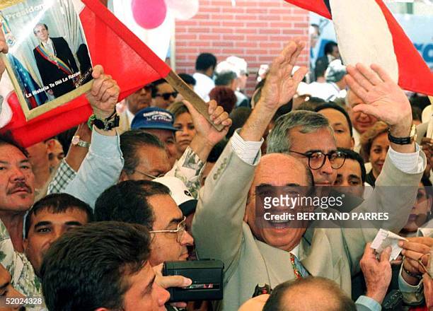 Carlos Andres Perez, ex-president of Venezuela, greets his supporters during the inauguration of the headquarters of the new movement, Apertura,...