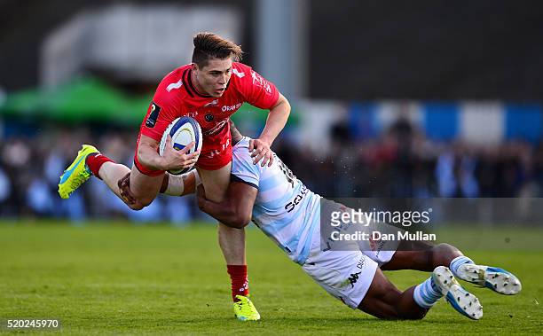 James O'Connor of Toulon is tackled by Joe Rokocoko of Racing 92 during the European Rugby Champions Cup Quarter Final between Racing 92 and RC...