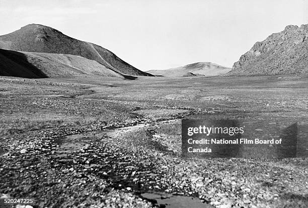 Ground-level view of the rocky landscape one of the Queen Elizabeth Islands in the Canadian Arctic Archipelago, Canada, 1958. The photo was taken...