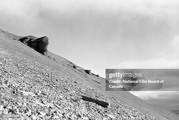 Ground-level view of the rocky landscape one of the Queen Elizabeth Islands in the Canadian Arctic Archipelago, Canada, 1958. The photo was taken...
