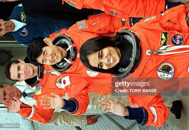 Indian-American astronaut Kalpana Chawla , Japanese astronaut Takao Doi , representing the Japanese National Space Development Agency , and Ukrainian...