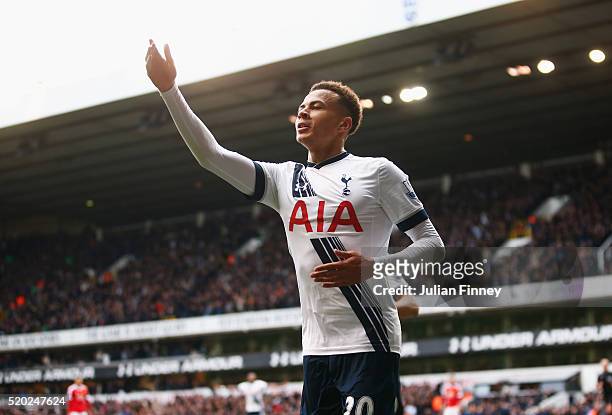 Dele Alli of Tottenham Hotspur celebrates as he scores their first goal during the Barclays Premier League match between Tottenham Hotspur and...