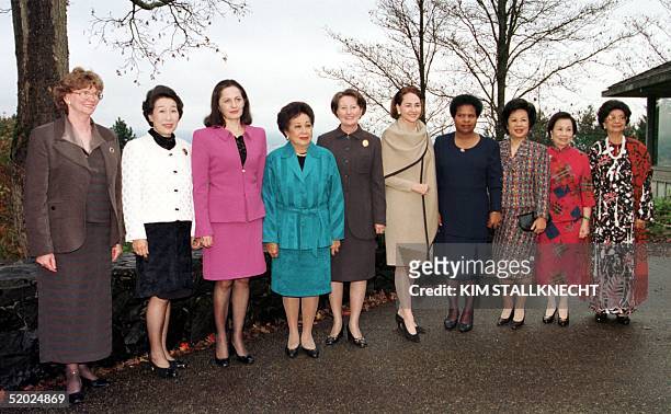The spouses of the leaders of the Asia Pacific Economic Cooperation group from New Zealand, Joan Bolger, Japan, Kumiko Hashimoto, Mexico, Nilda...
