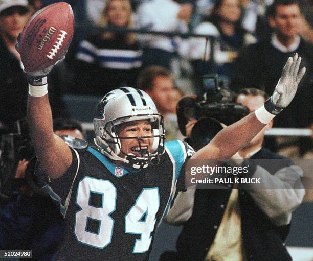 Carolina Panther wide receiver Rae Carruth celebrates his 15-yard touchdown catch in the second quarter of play against the Dallas Cowboys at Texas...