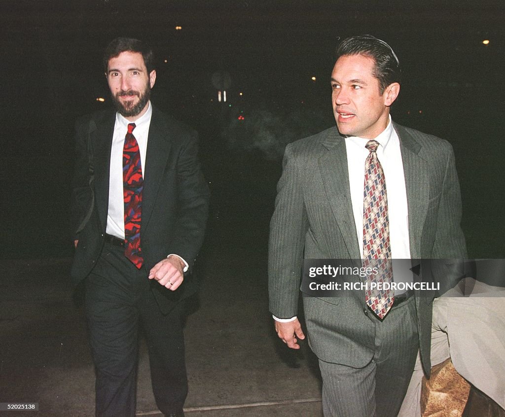 Federal prosecutors Robert Cleary (L) and Stephen