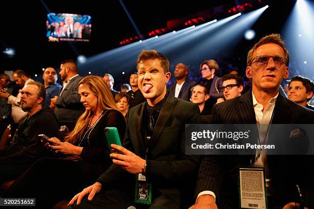 Singer Trent Harmon, winner of season 15 of "American Idol," sits ringside during the welterweight championship fight between Manny Pacquiao and...