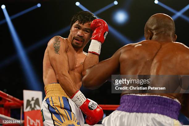 Manny Pacquiao avoids a punch from Timothy Bradley Jr. During their welterweight championship fight on April 9, 2016 at MGM Grand Garden Arena in Las...