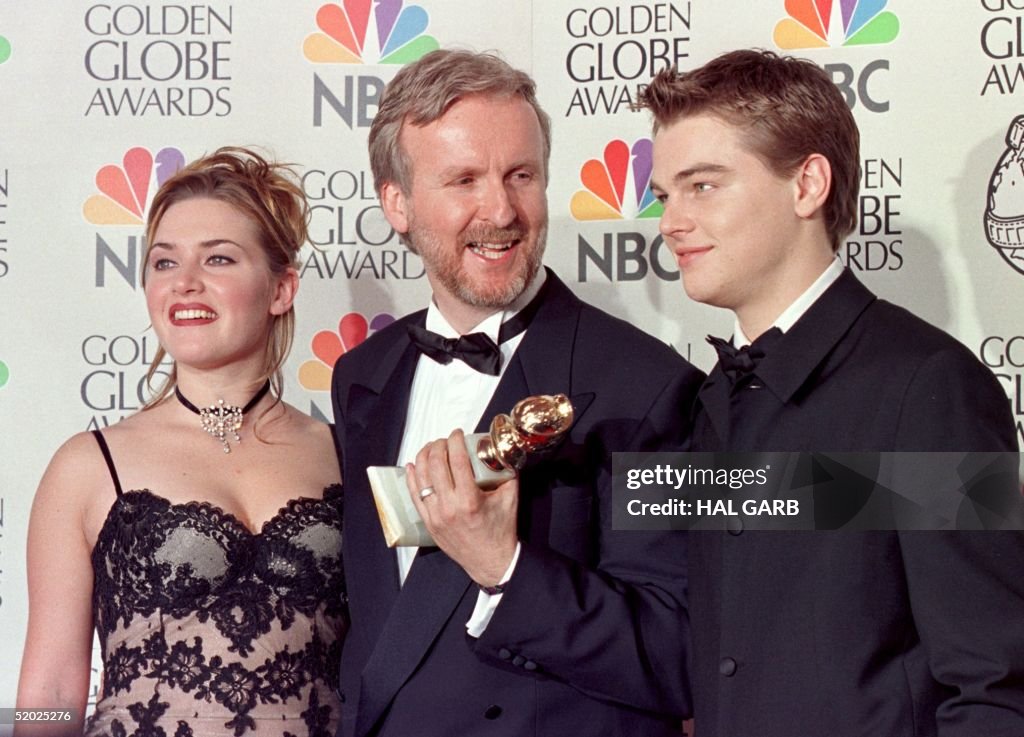 Director James Cameron(C) and actress Kate Winslet