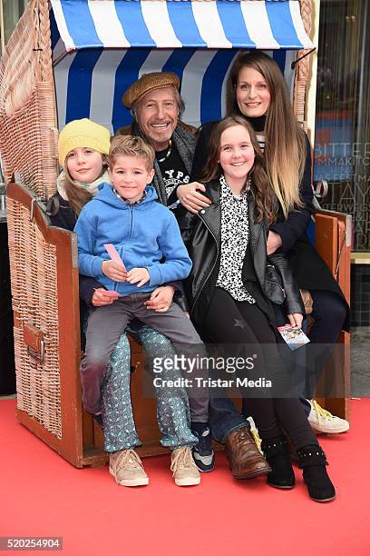 Reiner Schoene and his wife Anja Schoene with daughter Charlotte-Sophie Schoene and other kids attend the 'Rico, Oskar und der Diebstahlstein' Berlin...