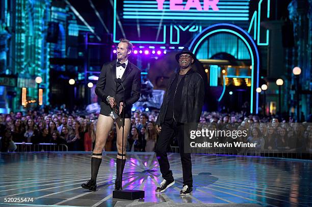 Actors Alexander Skarsgard and Samuel L. Jackson speak onstage during the 2016 MTV Movie Awards at Warner Bros. Studios on April 9, 2016 in Burbank,...