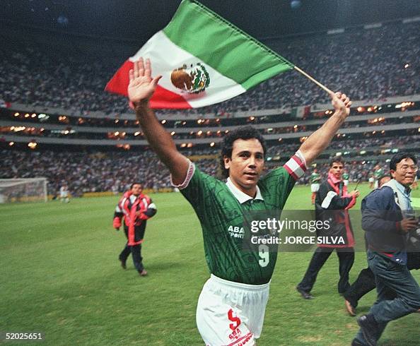 Mexican soccer player Hugo Sanchez waves to fans w Mexican soccer player Hugo Sanchez waves to fans w