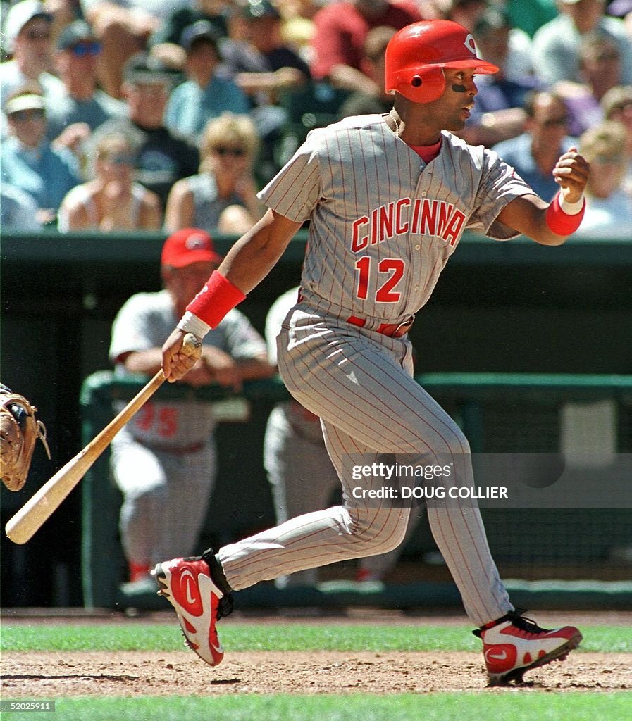 Cincinnati Reds player Willie Greene follows throu