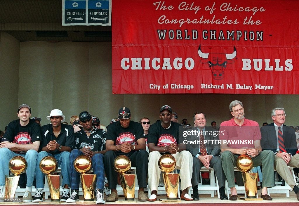 From left, Chicago Bulls players Toni Kukoc, Ron H