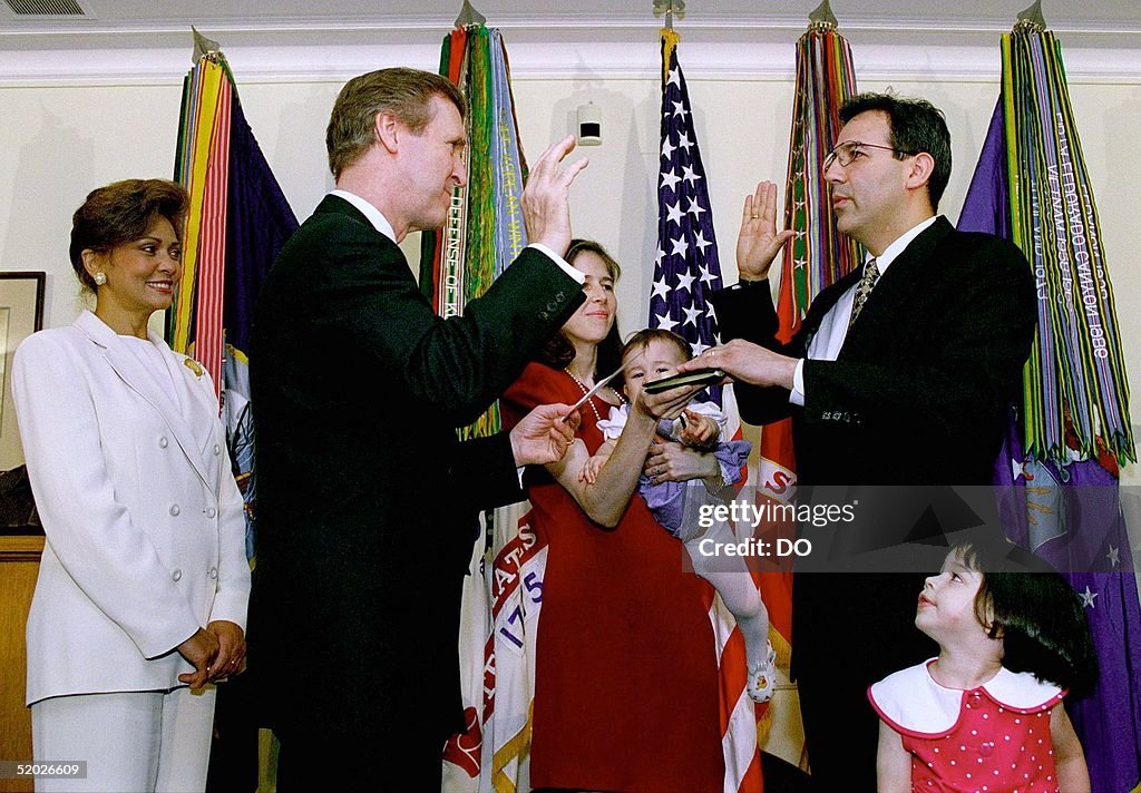 Secretary of Defense William S. Cohen (2nd L) admi