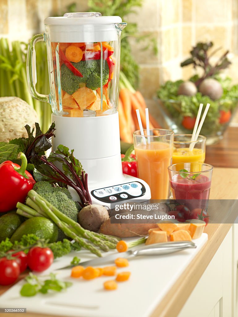 Blender In Kitchen With Range Of Fresh Fruits And Vegetables High-Res Stock  Photo - Getty Images