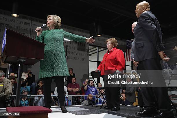 Democratic presidential candidate Hillary Clinton takes the stage with members of the Maryland congressional delegation, including Sen. Barbara...
