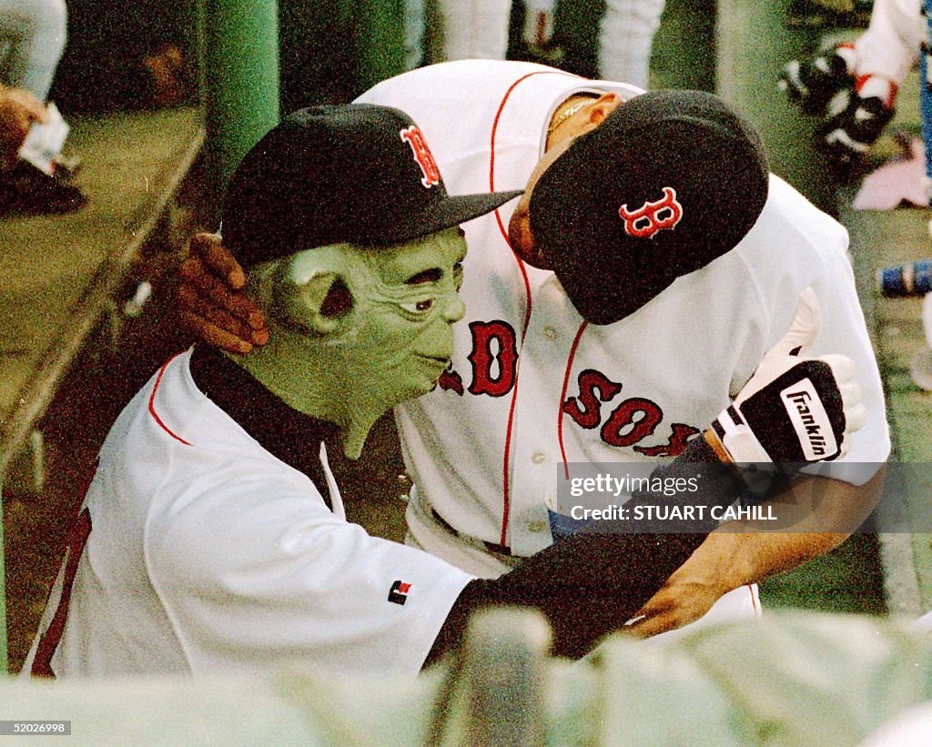 Boston Red Sox pitcher Pedro Martinez (R), wearing