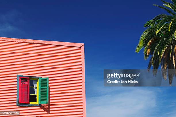brightly painted house in la boca - la boca stock pictures, royalty-free photos & images