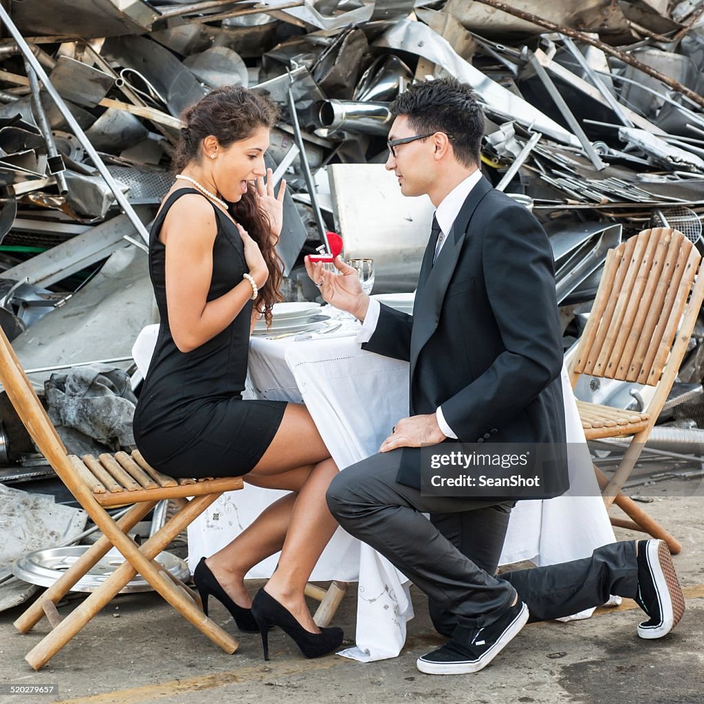Elegant Man Giving an Engagement Ring in Landfill