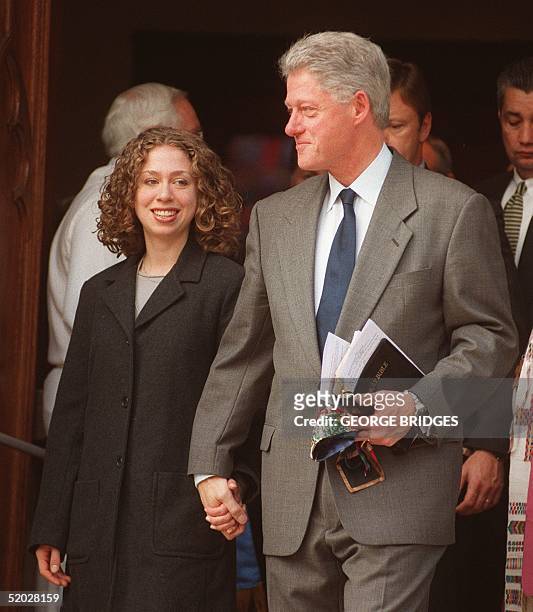 President Bill Clinton leaves Foundry Methodist church 20 December in Washington, DC, with his daughter Chelsea. Clinton has become the second...