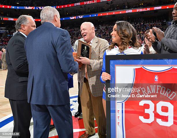 Retired referee Joey Crawford accepts an award prior to the Philadelphia 76ers against Milwaukee Bucks the at Wells Fargo Center on April 10, 2016 in...