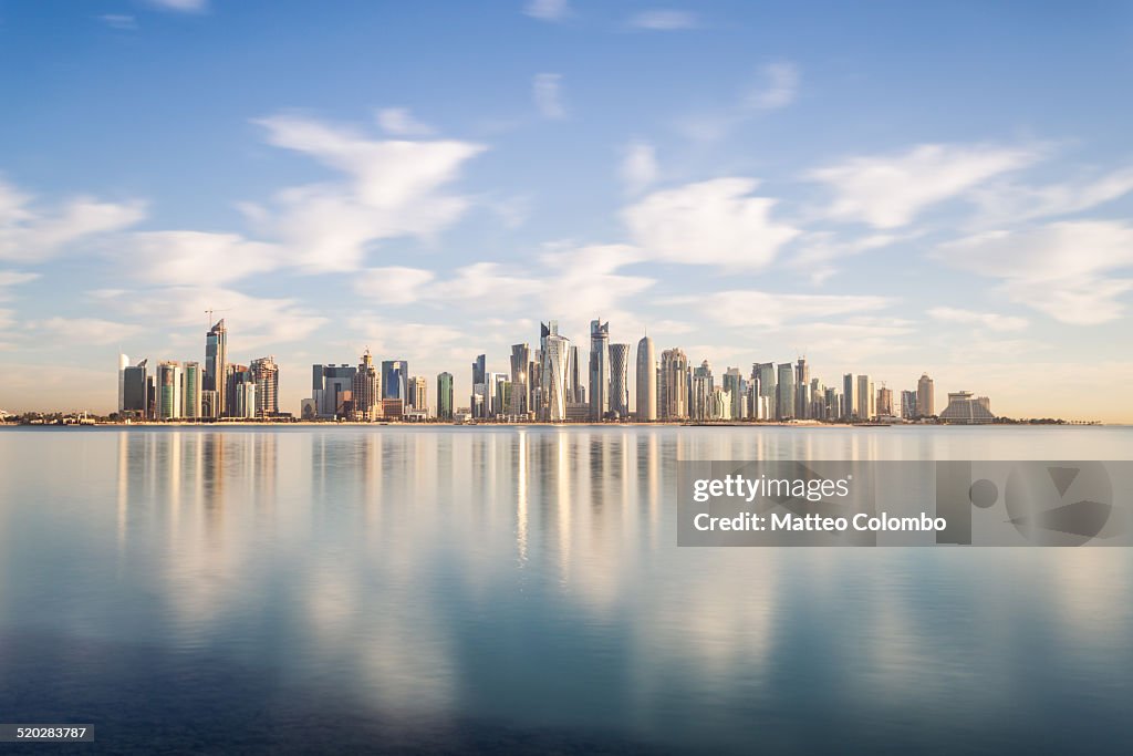 Doha modern city reflected in the sea, Qatar