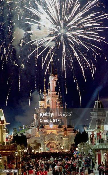 Spectators admire fireworks over Sleeping Beauty's castle late 11 April during the press preview of the new Euro Disney park. AFP PHOTO