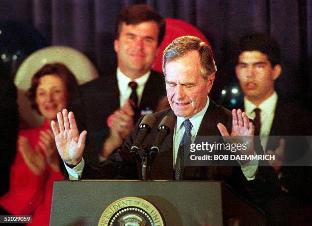 President George Bush concedes the election as family members look on 03 November after losing to President-elect Bill Clinton. President Bush urged...