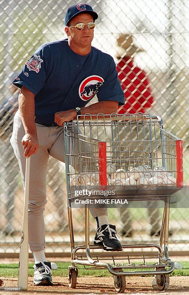 James Riggleman Chicago Cubs manager Jim Riggleman rests on a shopping cart filled ...