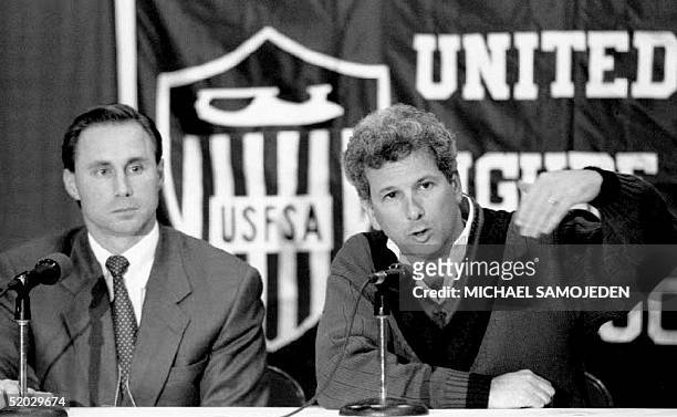 Dr. Steven Plomaritis looks on as Jerry Soloman , manager of US figure skater Nancy Kerrigan, speaks in Detroit, MI 6th January 1994 about the attack...
