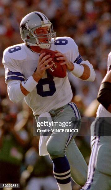 Dallas Cowboys quarterback Troy Aikman drops back to pass 31 January, 1993 during Super Bowl XXVII in Pasadena, CA. Aikman and the Cowboys defeated...