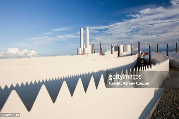 wind turbine parts for the walney offshore wind farm on the dockside at mostyn, north wales. - siemens stock pictures, royalty-free photos & images