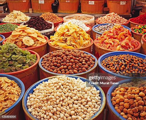 dried fruit and nuts at gyeongdong market in seoul - fruta seca fotografías e imágenes de stock