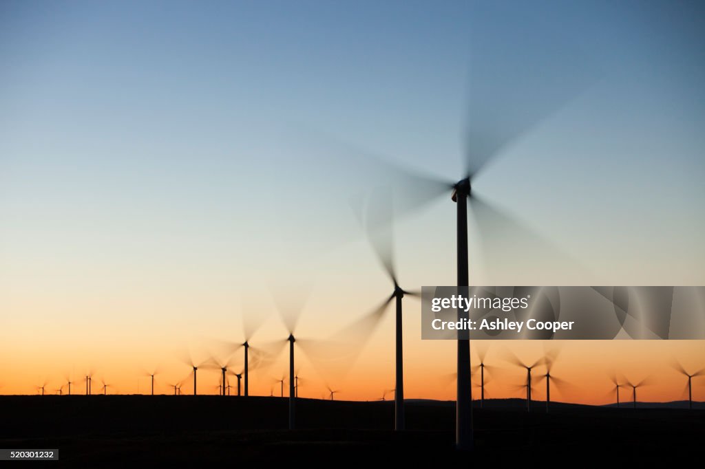 Dawn over Whitlee wind farm on Eaglesham Moor just south of Glasgow in Scotland, UK, is Europes largest onshore wind farm with 140 turbines and an installed capacity of 322 MW, enough energy to power 180,000 homes.