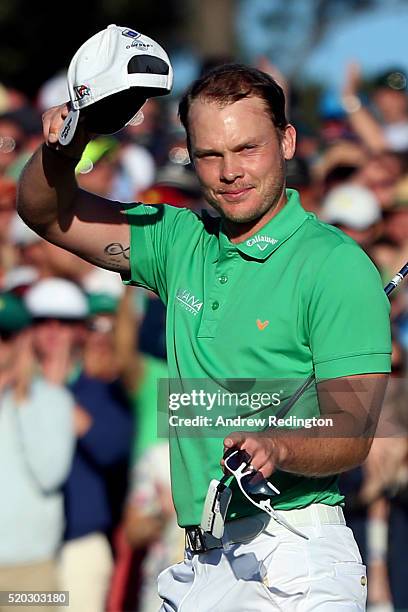 Danny Willett of England reacts after finishing on the 18th green during the final round of the 2016 Masters Tournament at Augusta National Golf Club...