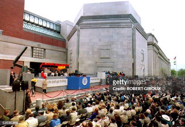 More than 10,000 people gather at the United States Holocaust Memorial Museum dedication ceremony 22 April 1993 to observe the lighting of the...
