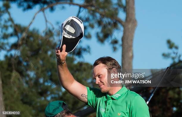 England's Danny Willett celebrates on the 18th green during Round 4 of the 80th Masters Golf Tournament at the Augusta National Golf Club on April 10...