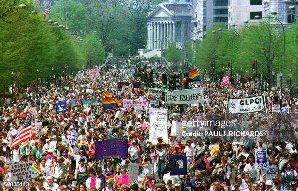 Hundreds of thousands of gay-rights demonstrators march down Pennsylvania Avenue in downtown Washington D.C. 25 April 1993. The march, which is...