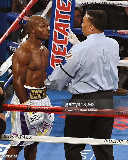 Referee Tony Weeks gives Timothy Bradley Jr. A count after he was knocked down by Manny Pacquiao in the seventh round of their welterweight fight at...