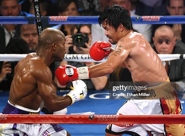 Manny Pacquiao throws a left at Timothy Bradley Jr. In the seventh round of their welterweight fight at MGM Grand Garden Arena on April 9, 2016 in...