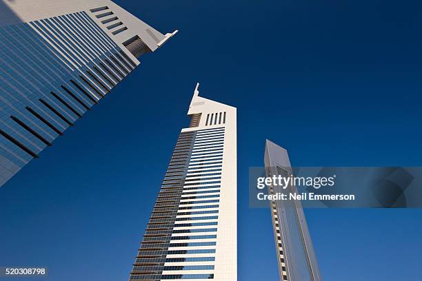 emirates towers, dubai - emirates towers stock pictures, royalty-free photos & images
