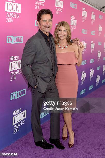 Actor John Stamos and actress Lori Loughlin attend 2016 TV Land Icon Awards at The Barker Hanger on April 10, 2016 in Santa Monica, California.