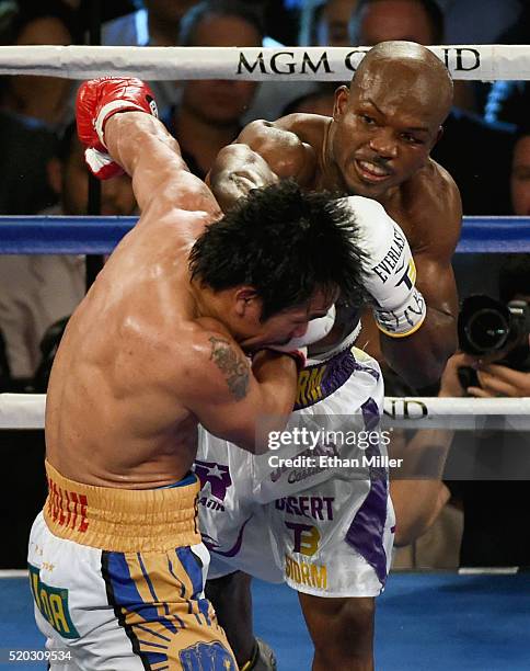 Manny Pacquiao and Timothy Bradley Jr. Battle in the ninth round of their welterweight fight at MGM Grand Garden Arena on April 9, 2016 in Las Vegas,...