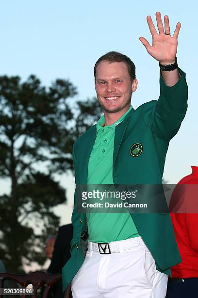 Danny Willett of England celebrates with the green jacket after winning the final round of the 2016 Masters Tournament at Augusta National Golf Club...