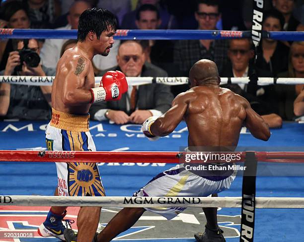 Manny Pacquiao knocks down Timothy Bradley Jr. In the ninth round of their welterweight fight at MGM Grand Garden Arena on April 9, 2016 in Las...