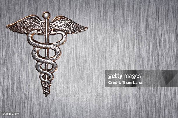 silver caduceus - caduceus stock pictures, royalty-free photos & images