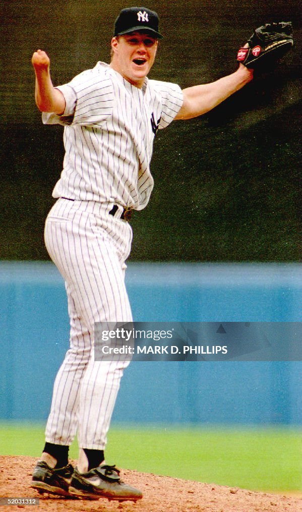 New York Yankees pitcher Jim Abbott celebrates aft