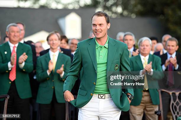 Danny Willett of England celebrates with the green jacket after winning the final round of the 2016 Masters Tournament at Augusta National Golf Club...