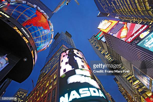 nasdaq sign in times square - nasdaq stock pictures, royalty-free photos & images