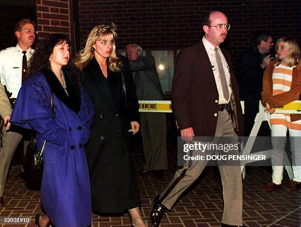 Lorena Bobbitt leaves the courthouse with an unidentified woman , 08 November 1993 where her husband John Wayne Bobbitt is on trial for marital...